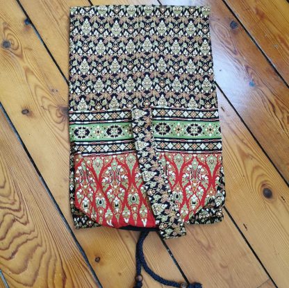 Sac tapis de yoga sol noir plié
